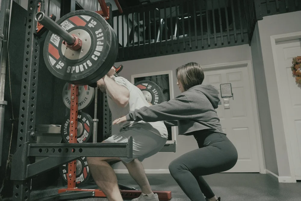 Melissa coaching a strength session